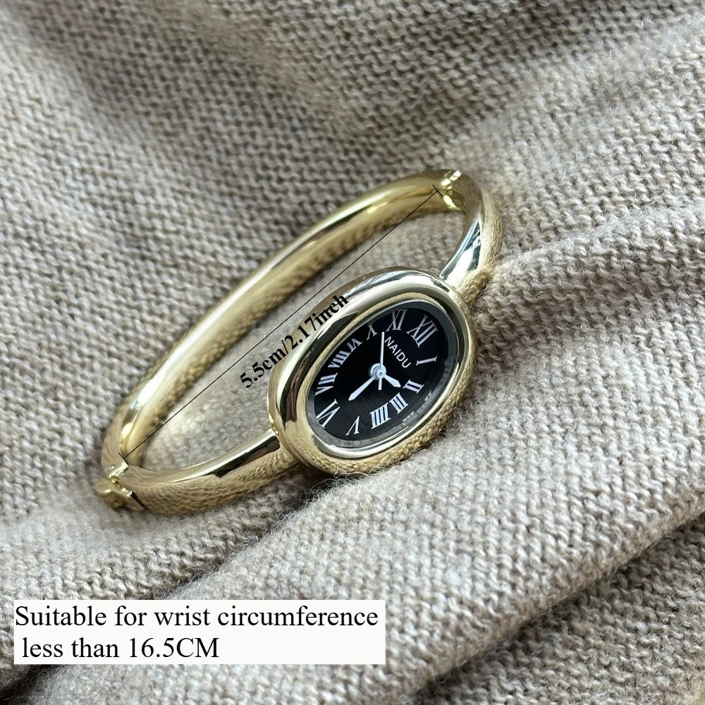 Vintage Bangle Watch – Roman Numeral Dial & Classic Oval Design