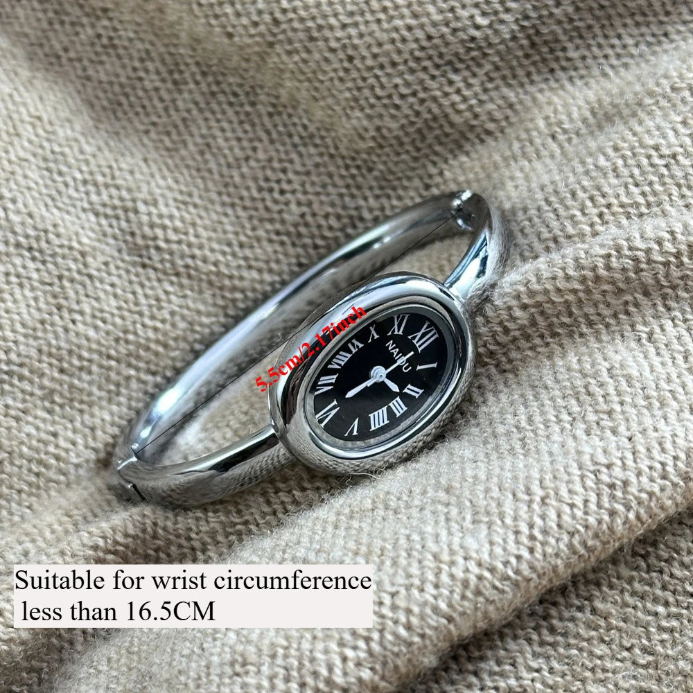 Vintage Bangle Watch – Roman Numeral Dial & Classic Oval Design