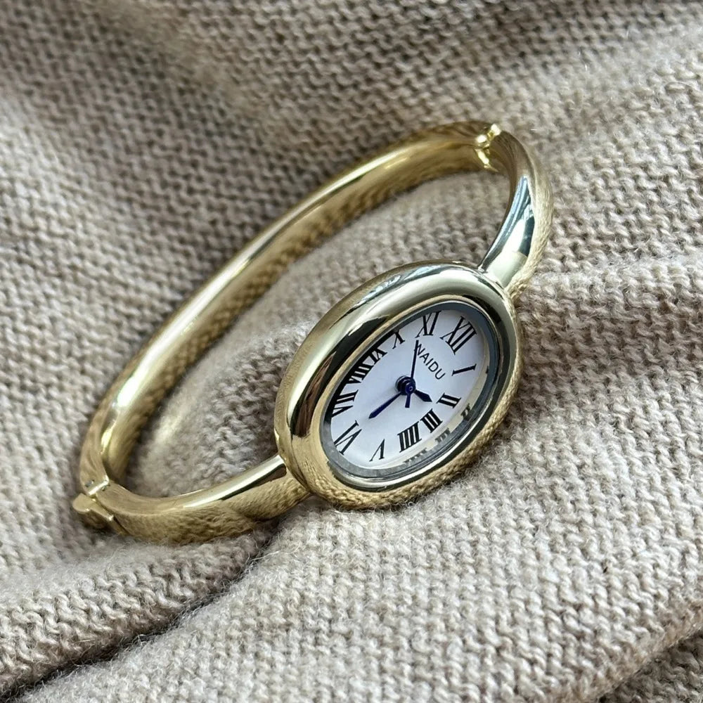 Vintage Bangle Watch – Roman Numeral Dial & Classic Oval Design