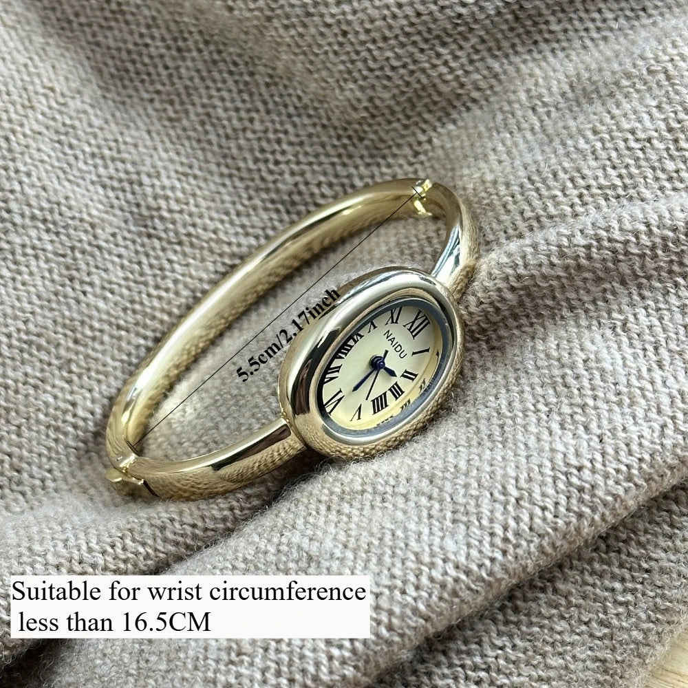 Vintage Bangle Watch – Roman Numeral Dial & Classic Oval Design