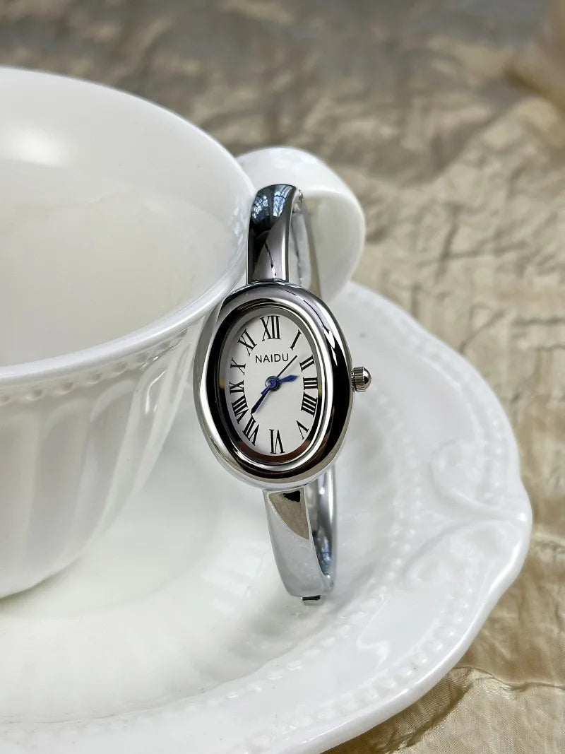 Vintage Bangle Watch – Roman Numeral Dial & Classic Oval Design