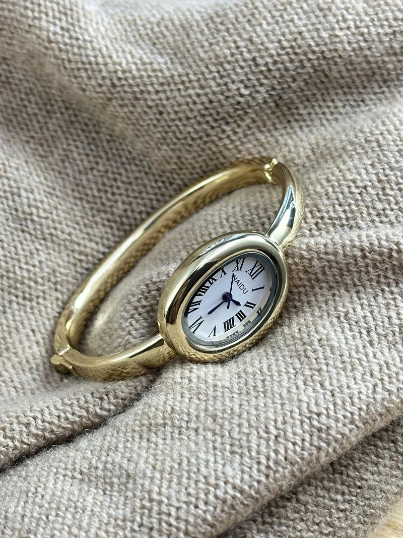 Vintage Bangle Watch – Roman Numeral Dial & Classic Oval Design