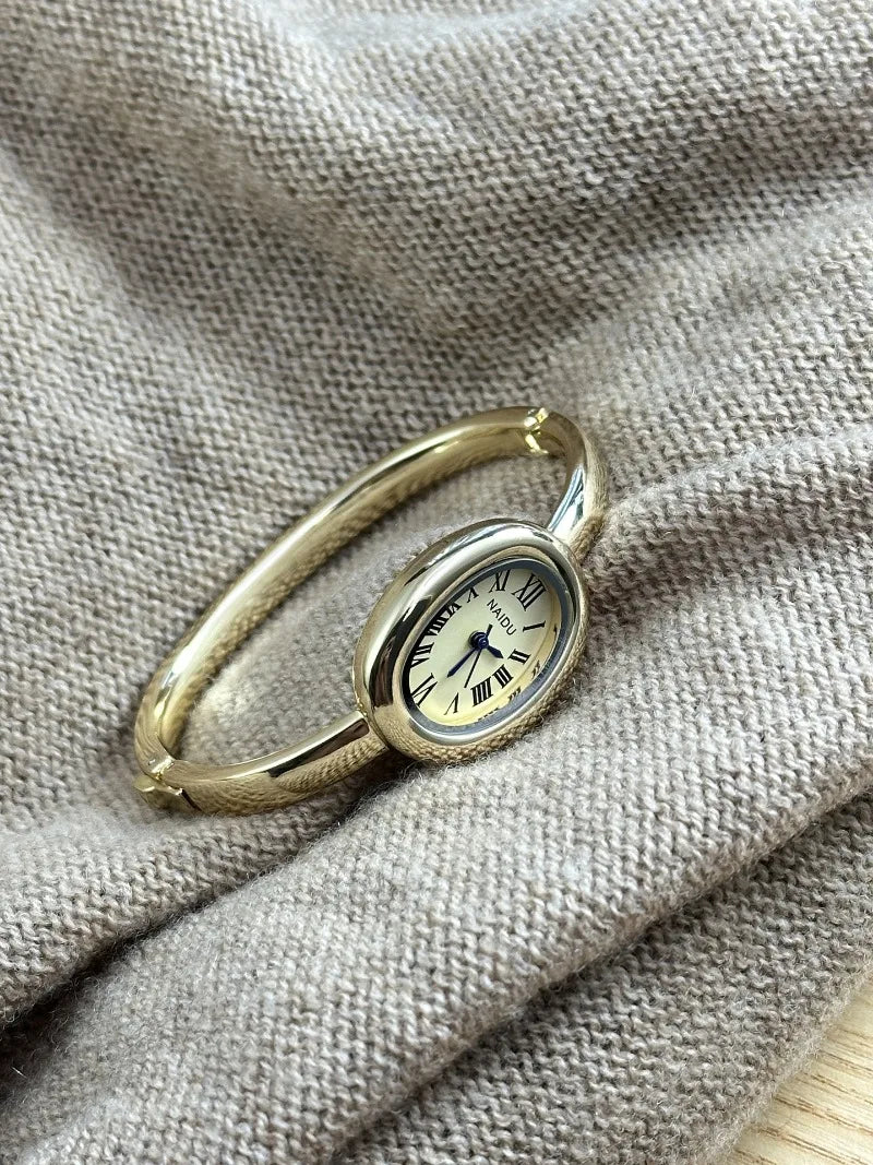 Vintage Bangle Watch – Roman Numeral Dial & Classic Oval Design