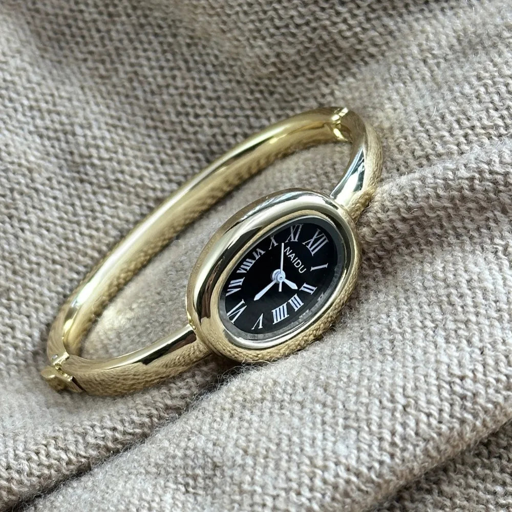 Vintage Bangle Watch – Roman Numeral Dial & Classic Oval Design